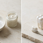 Tube of hydroxyapatite whitening toothpaste with paste on a toothbrush